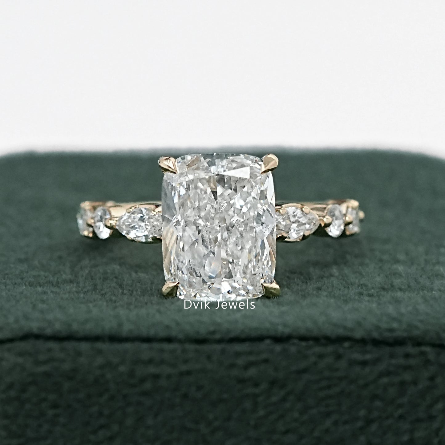 Cushion Cut Diamond Ring with Marquise Side Stones