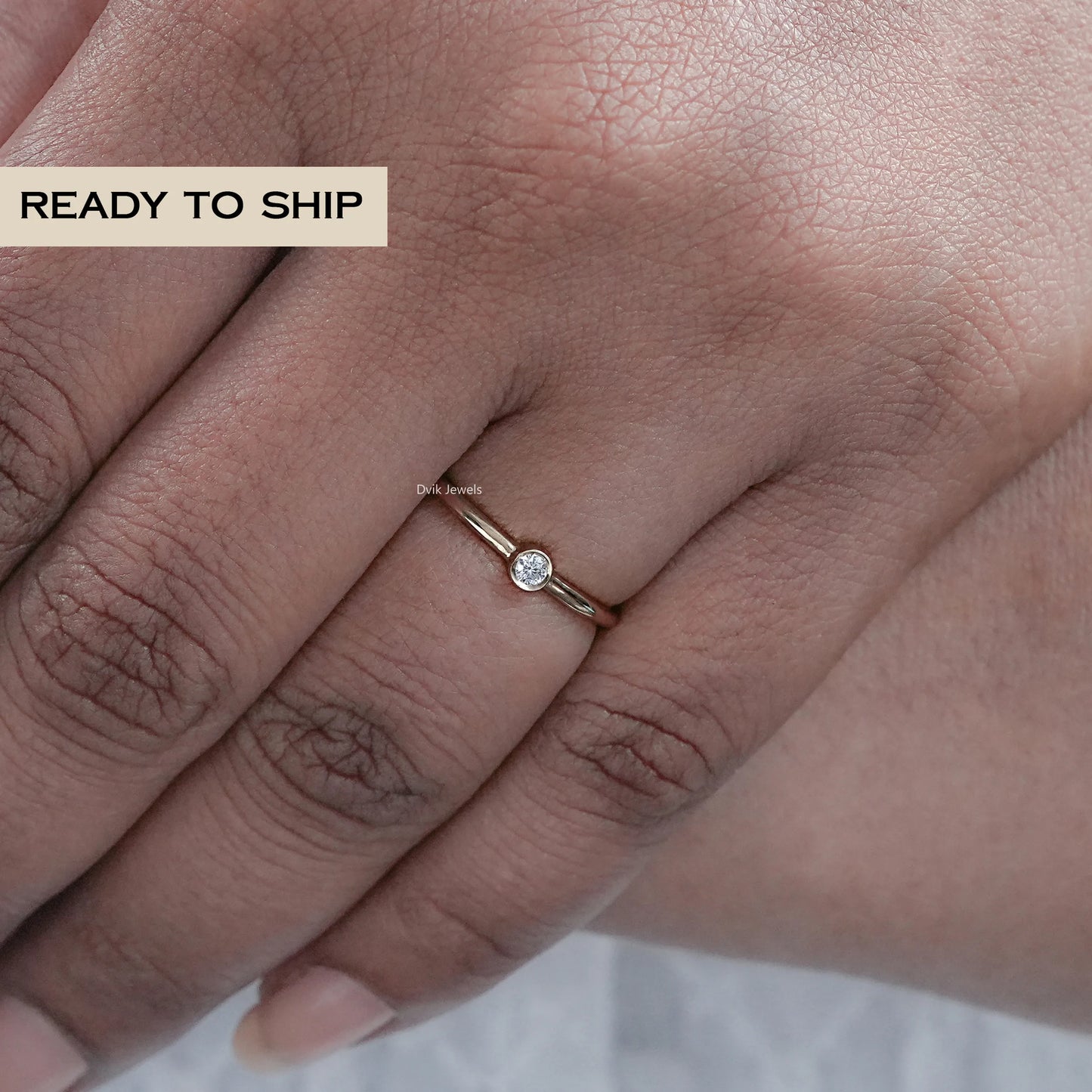 Round Diamond Bezel Set Engagement Ring