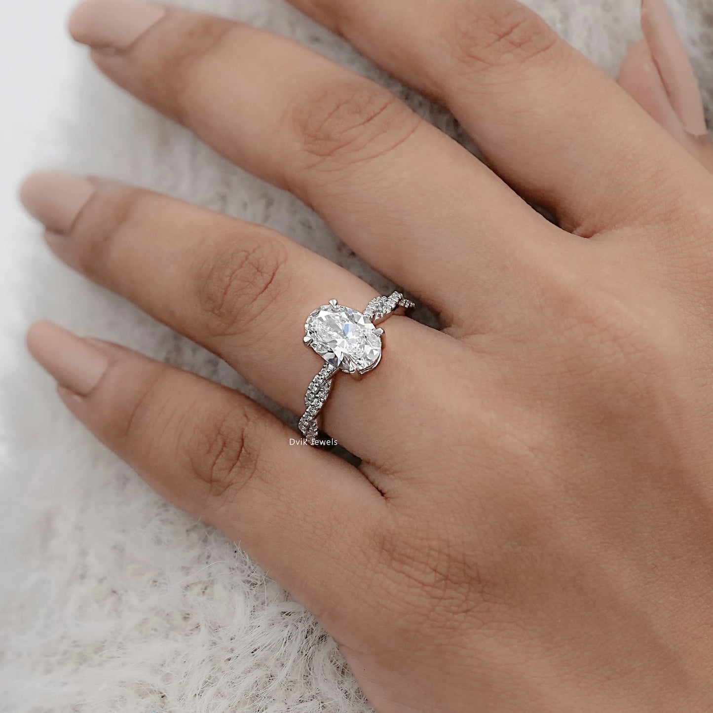 Twist Shank Oval Accent Diamond Ring