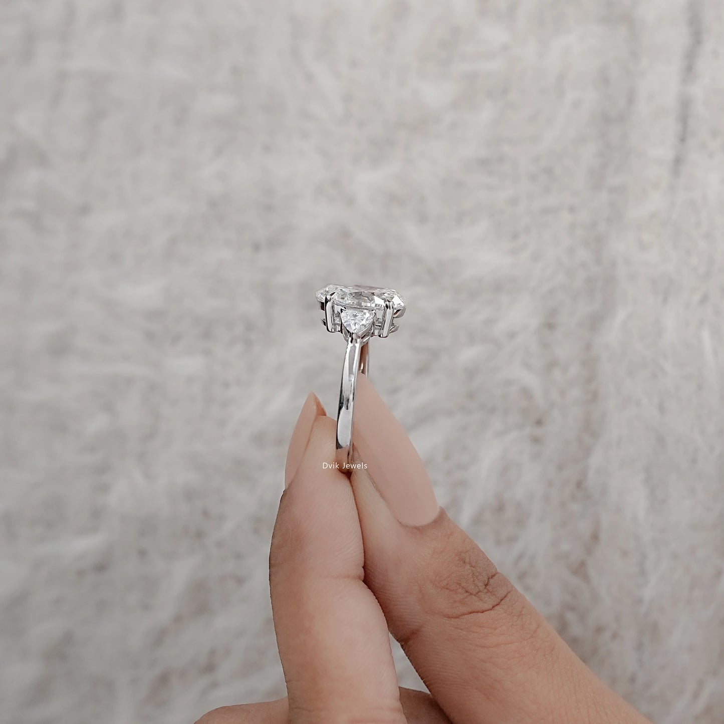 Three-Stone Oval And Round Cut Diamond Ring