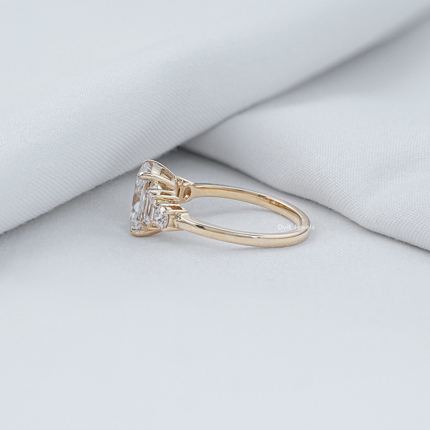Elongated Cushion Shape Five Diamond Engagement Ring