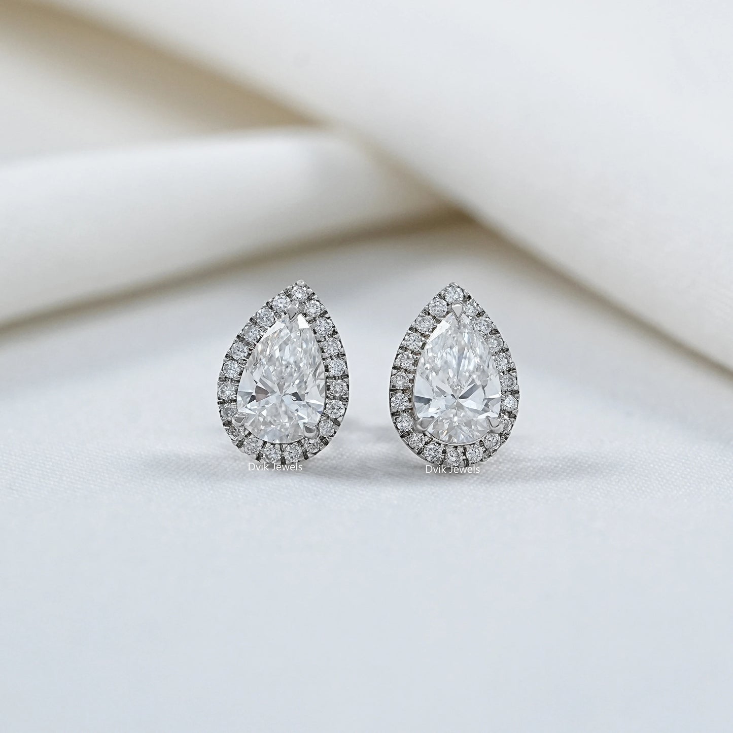 Pear Cut Lab Grown Diamond Halo Stud Earrings