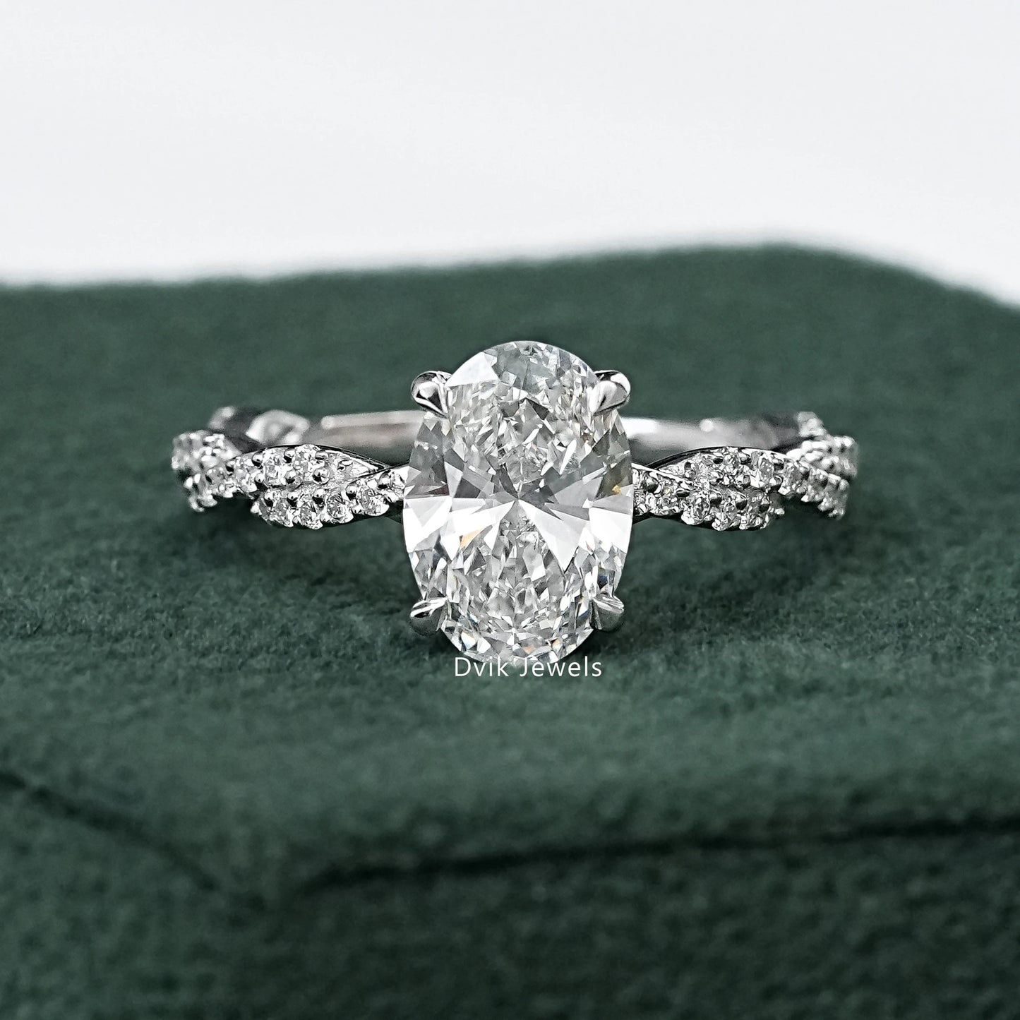 Twist Shank Oval Accent Diamond Ring