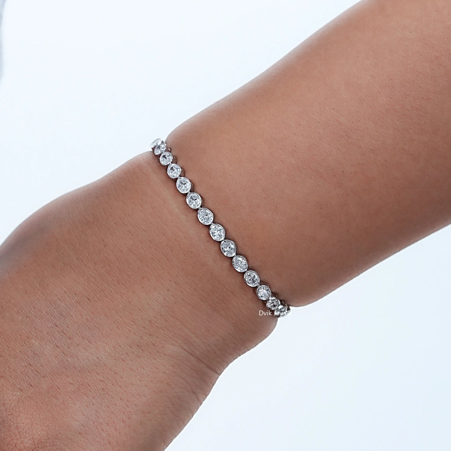 Oval Cut Diamond Bezel Set Tennis Bracelet