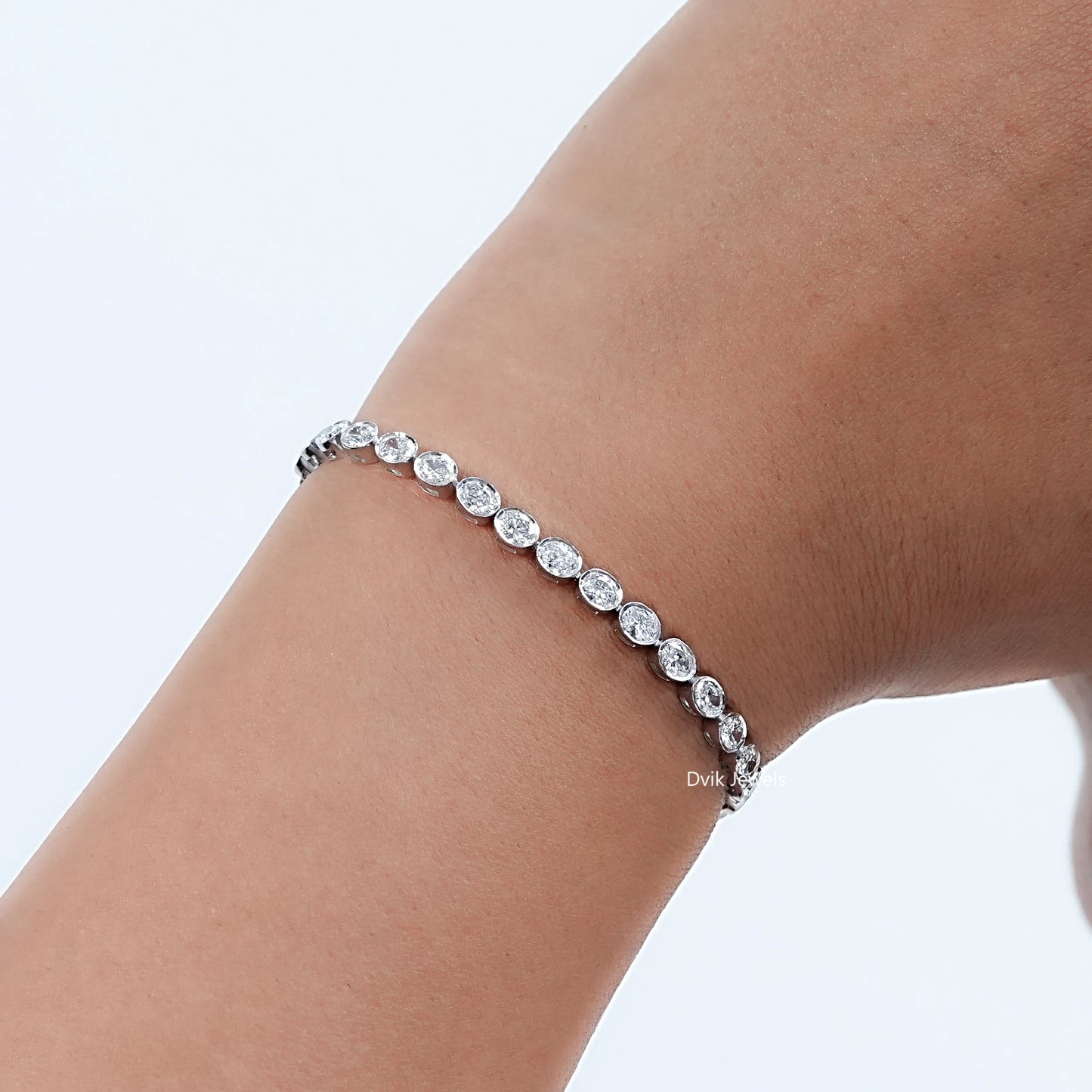 Oval Cut Diamond Bezel Set Tennis Bracelet