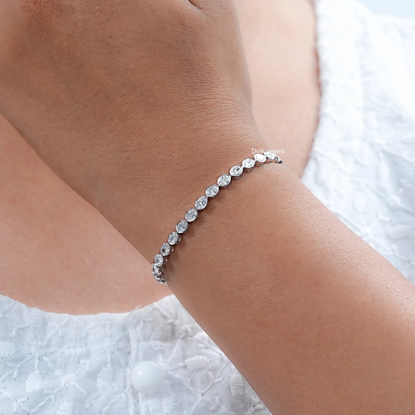 Oval Cut Diamond Bezel Set Tennis Bracelet