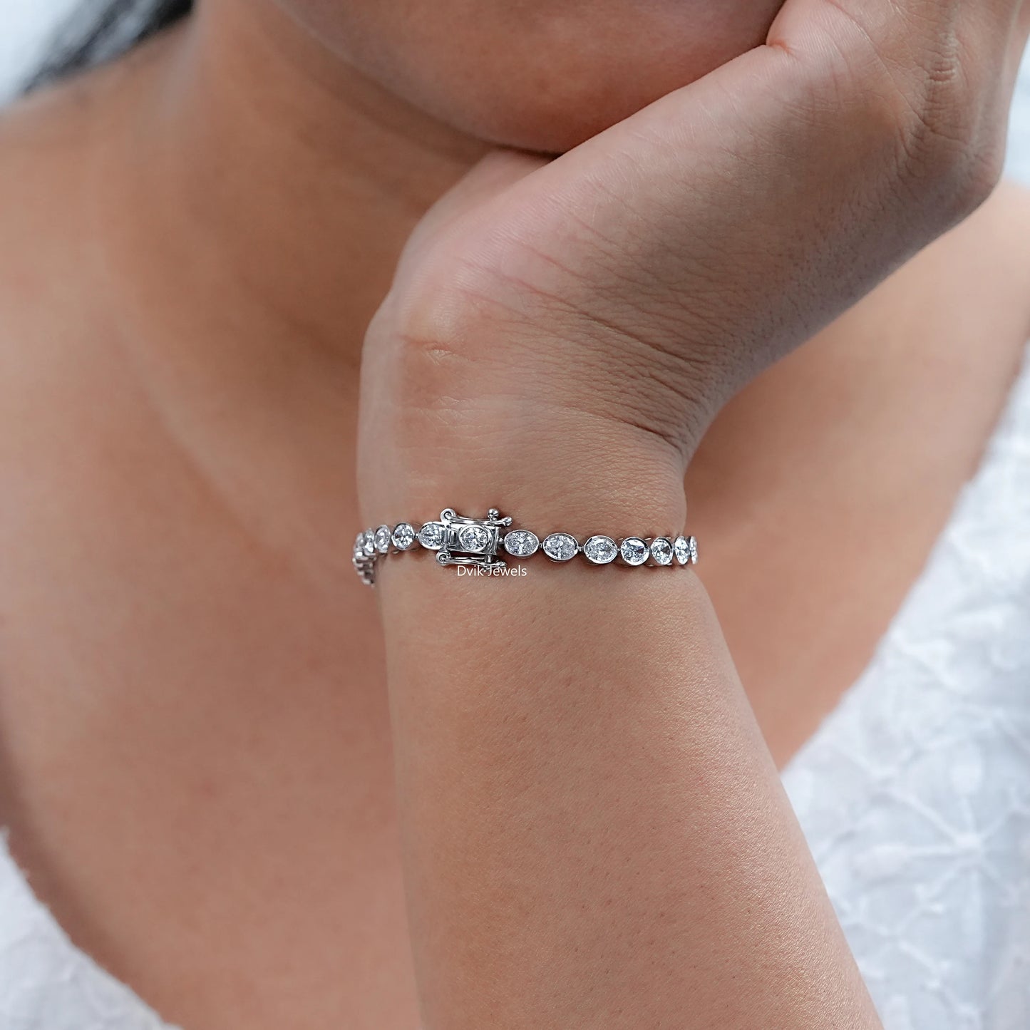 Oval Cut Diamond Bezel Set Tennis Bracelet