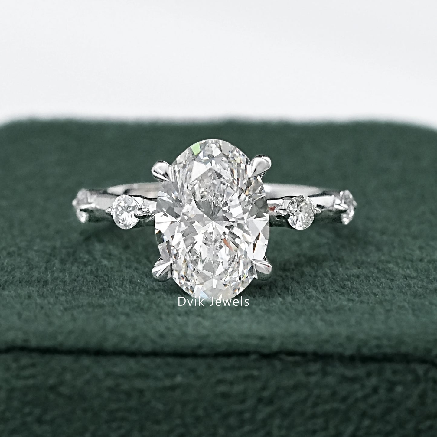 Oval Cut Side Diamond Accent Engagement Ring