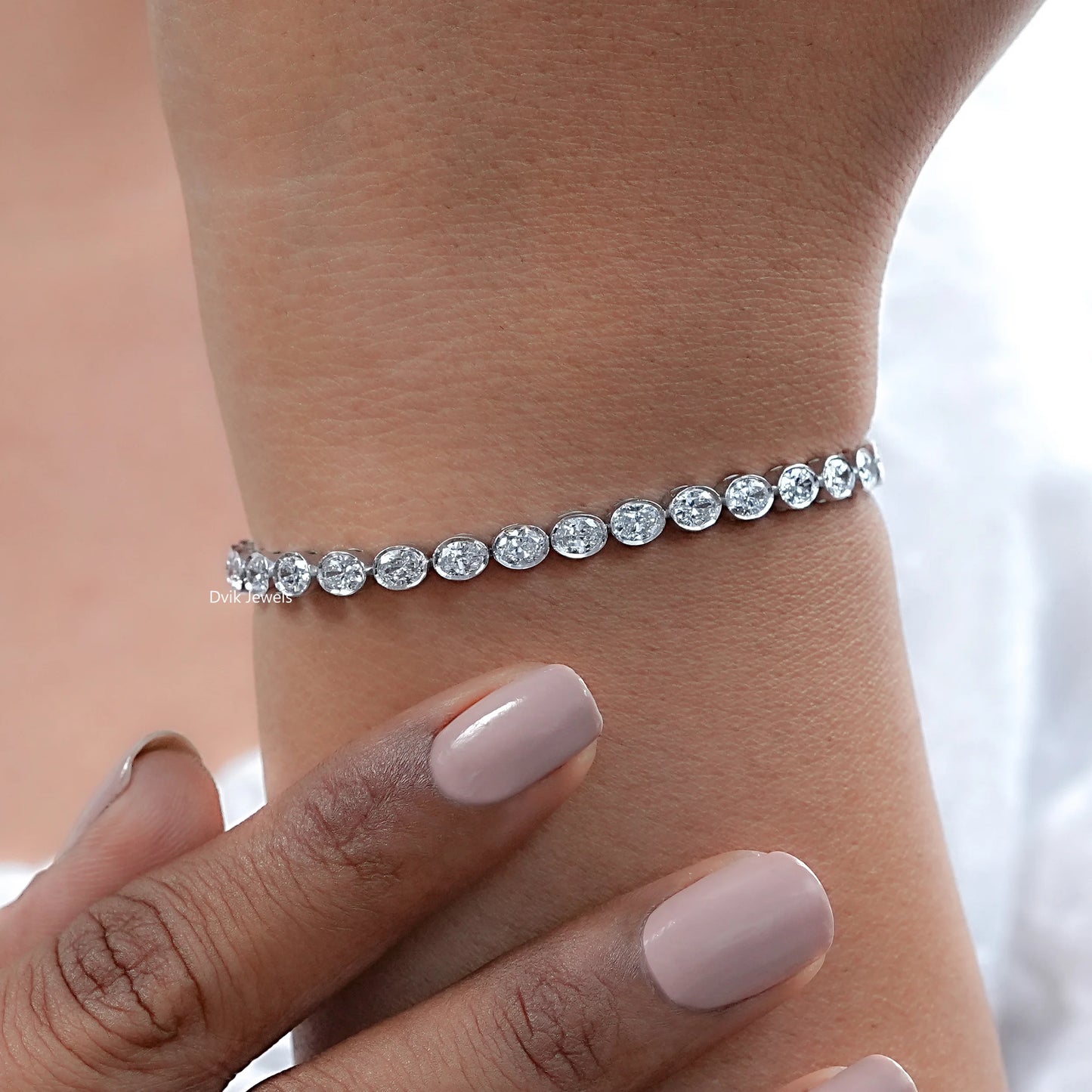 Oval Cut Diamond Bezel Set Tennis Bracelet