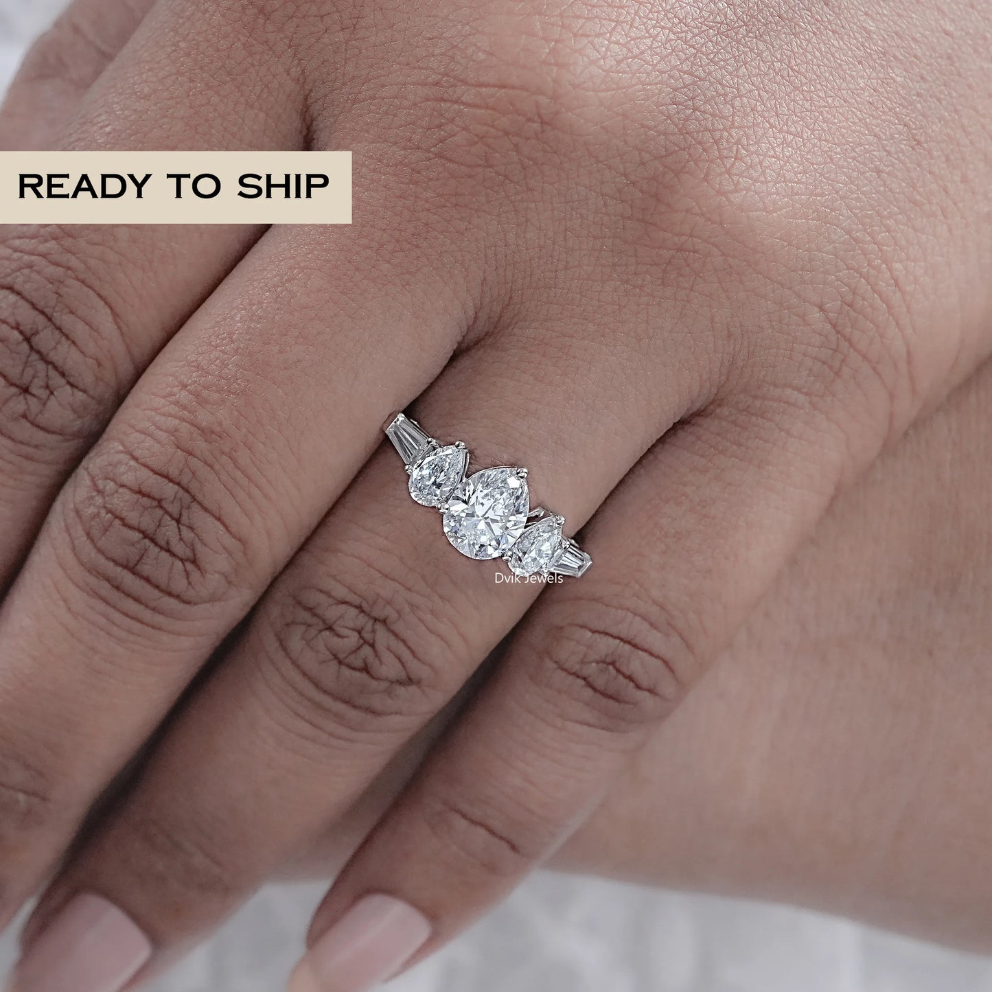 Pear And Baguette Diamond Five Stone Ring