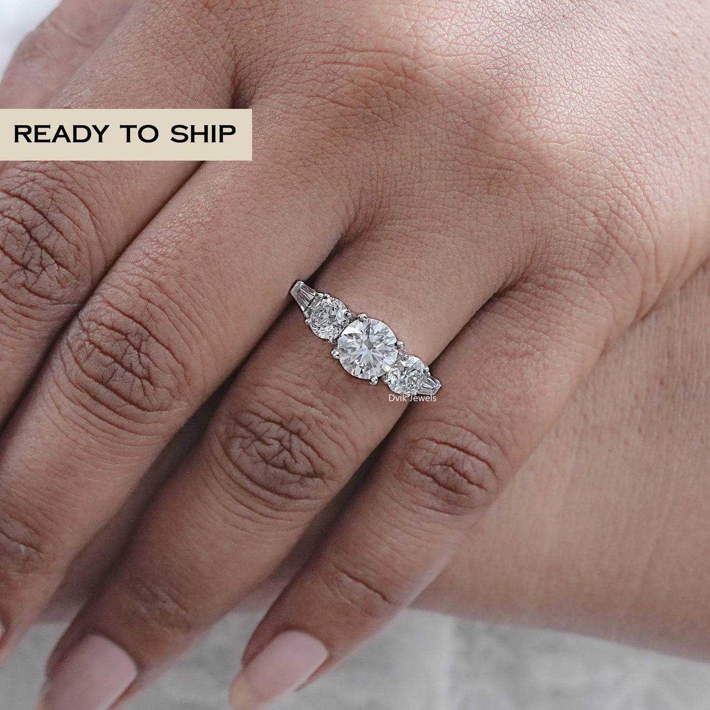 Five Stone Round And Tapered Baguette Diamond Ring
