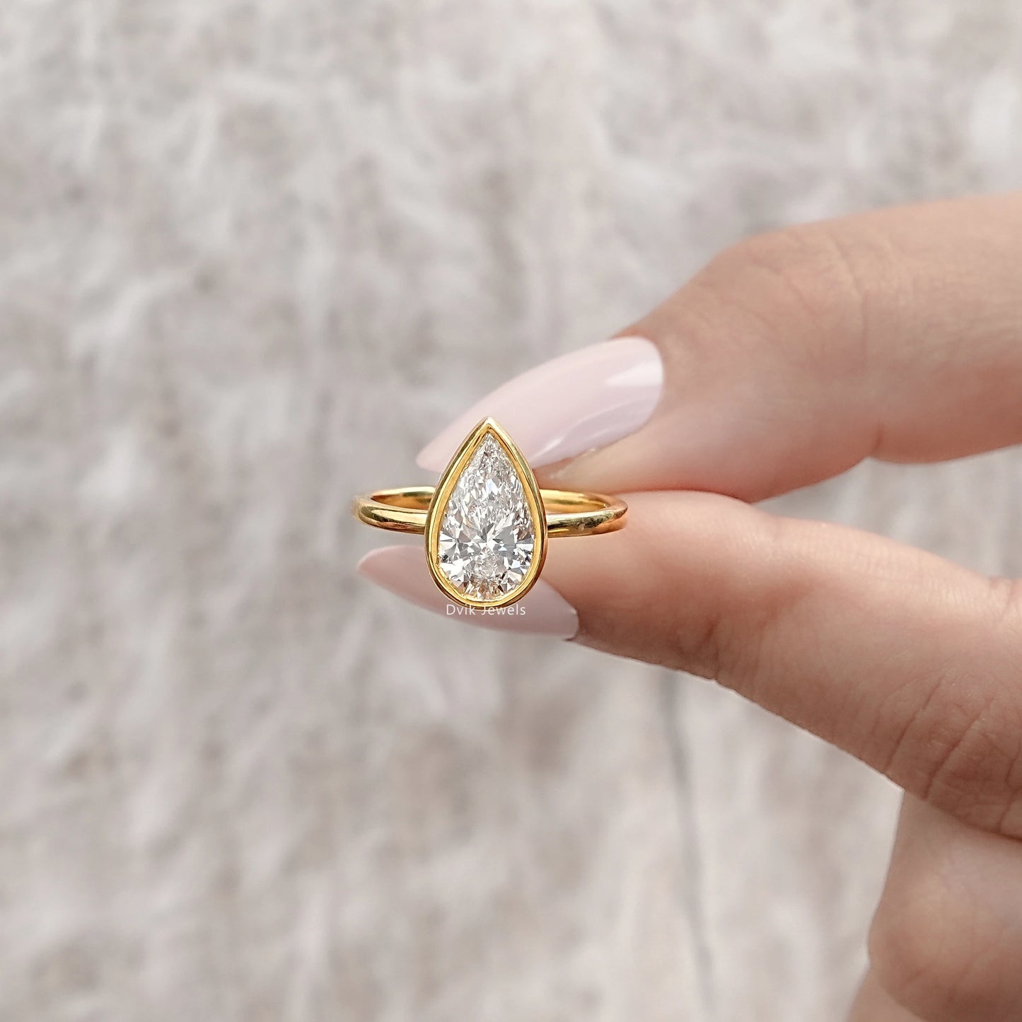Pear Diamond Bezel Set Solitaire Engagement Ring