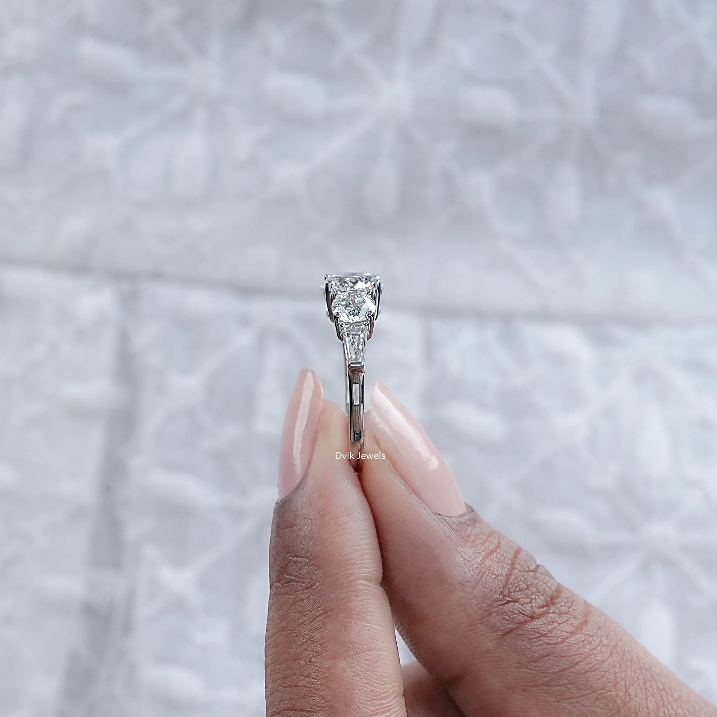 Five Stone Round And Tapered Baguette Diamond Ring
