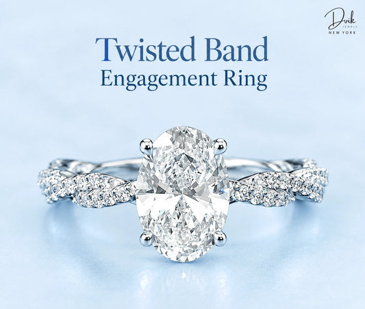 Showcasing an oval lab grown diamond twisted band engagement ring by Dvik Jewels, featuring pavé diamonds and a unique design.