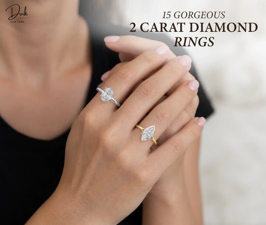 Oval and marquise 2 carat diamond engagement rings worn on a woman’s hand