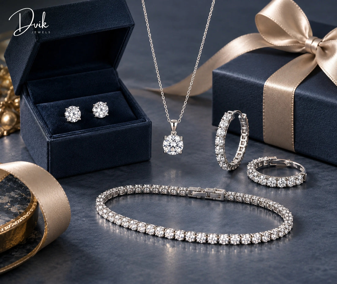 A matching diamond jewelry set including a necklace, tennis bracelet, stud earrings, and hoop earrings displayed with gift boxes.