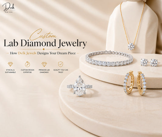 Custom lab grown diamond jewelry collection featuring pear shaped engagement ring, tennis bracelet, diamond pendant necklace, stud earrings and hoop earrings.