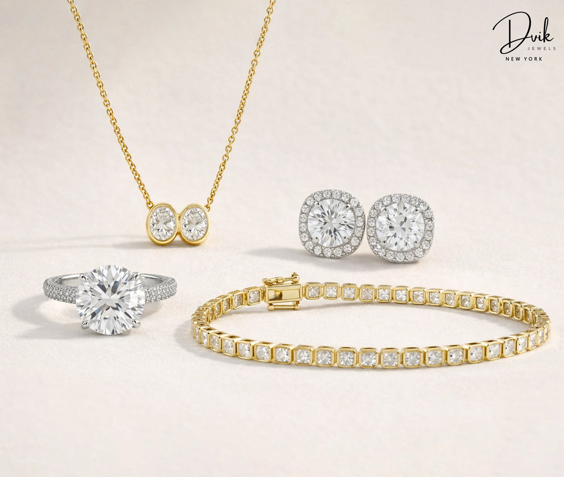 Dvik Jewels diamond ring, gold tennis bracelet, halo earrings, and double stone pendant necklace.
