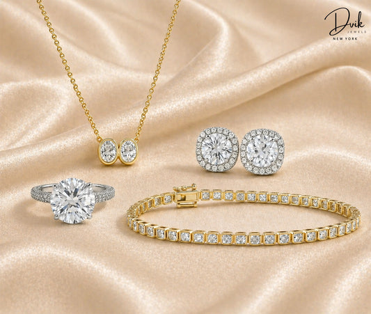 Lab grown diamond jewelry collection in Oregon featuring engagement ring, tennis bracelet, and earrings.