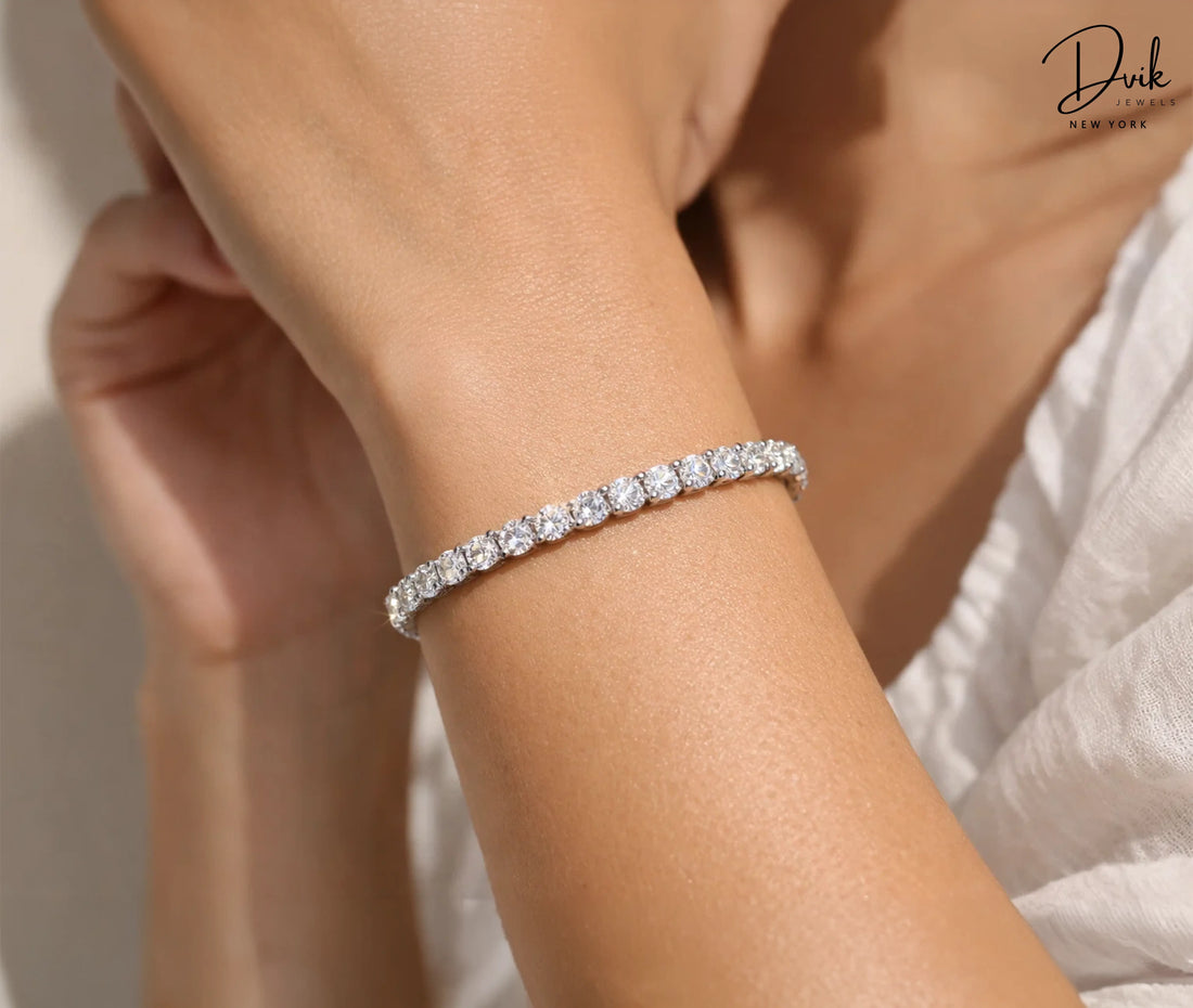 Round cut lab grown diamond tennis bracelet in white gold by Dvik Jewels New York.