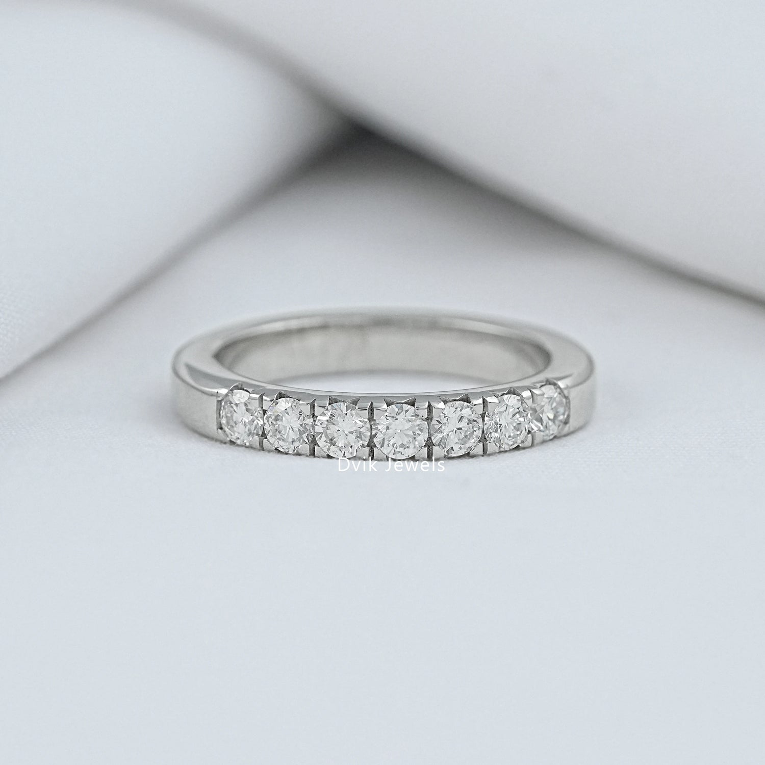 Seven stone round cut lab diamond wedding band by Dvik Jewels