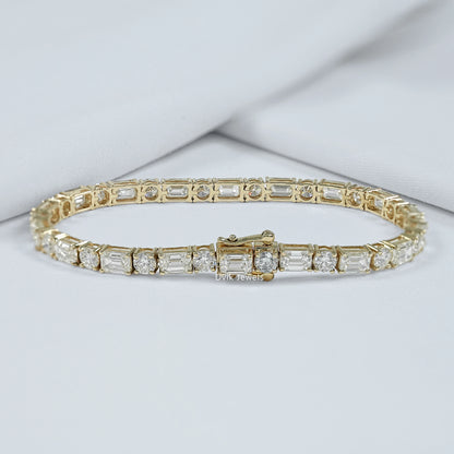 Back view of emerald cut tennis bracelet with round cut diamond showing the secure lock profile