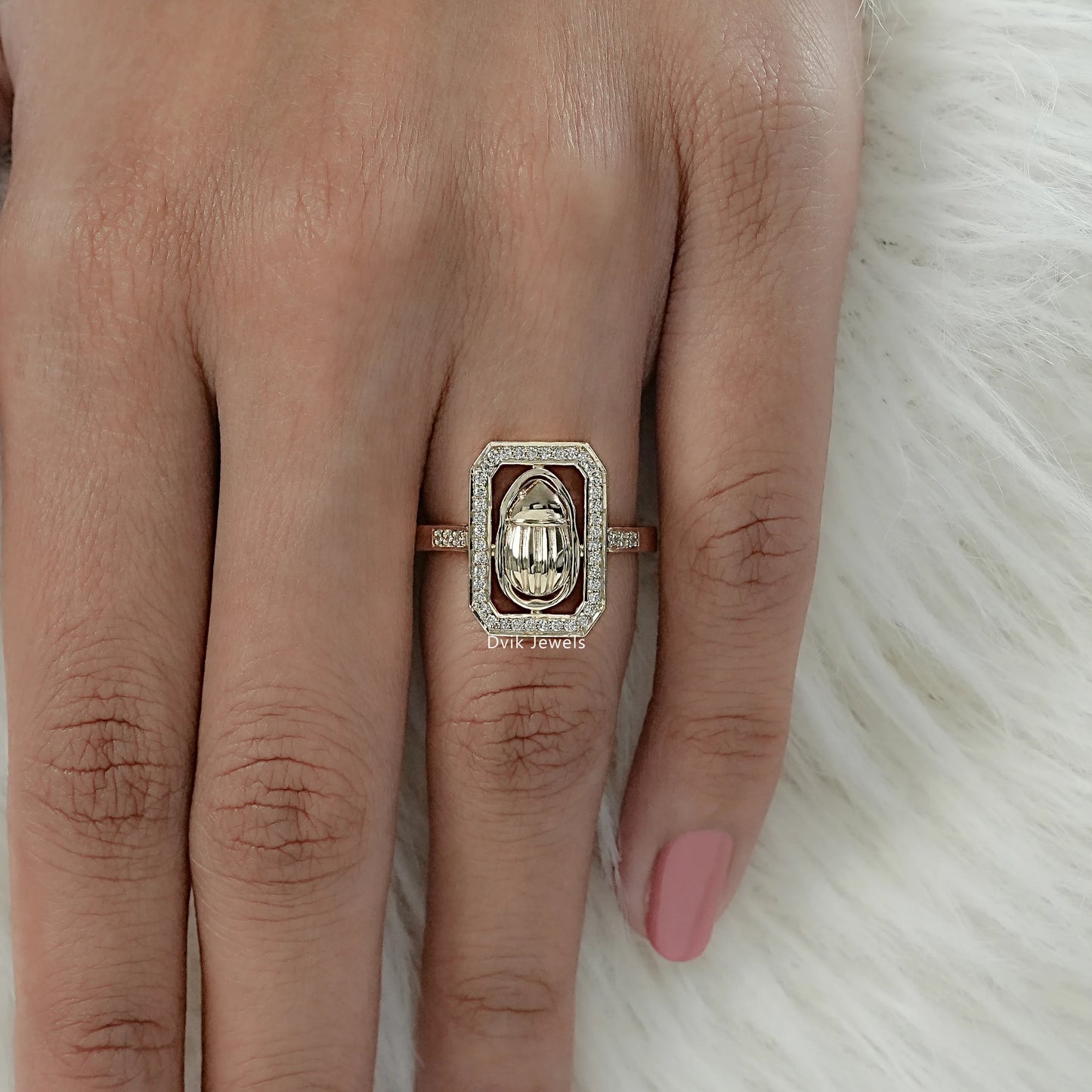 Halo diamond ring with round cut diamond and octagonal pave setting, worn by women