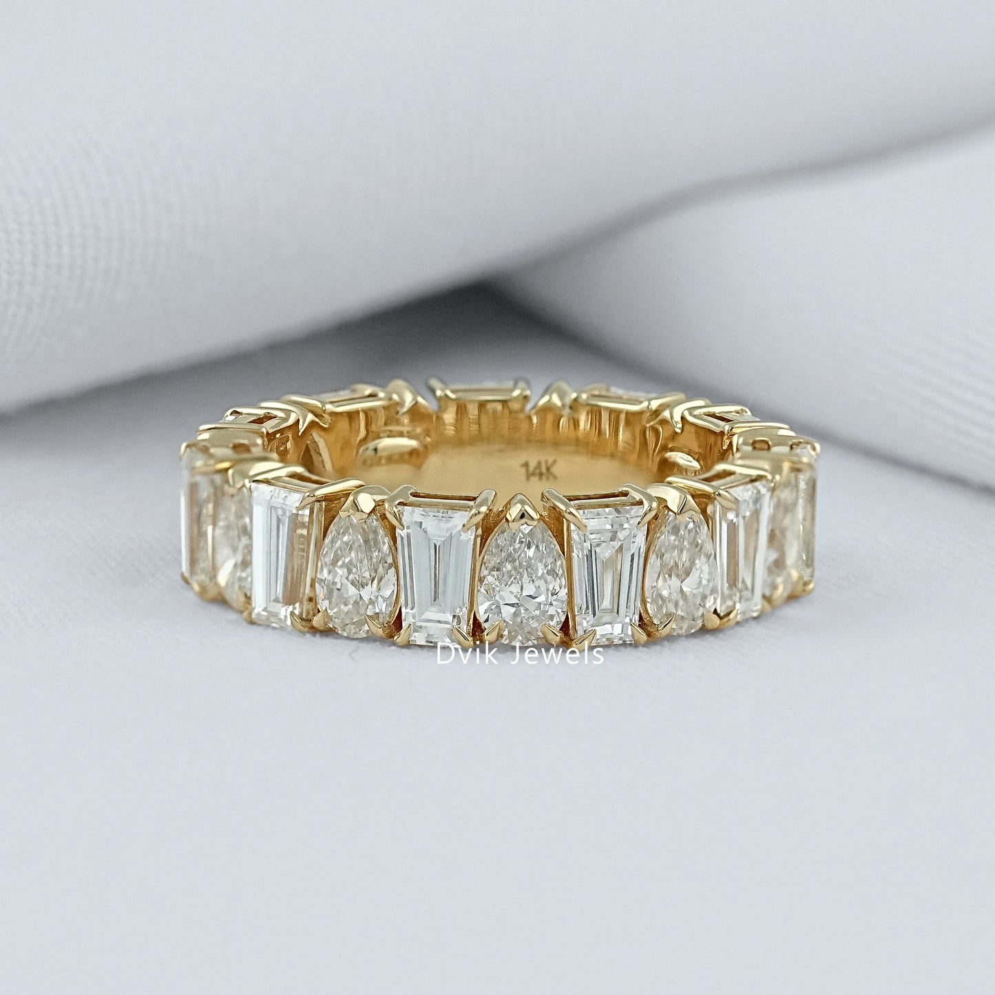 Pear And Tapered Baguette Diamond Eternity Band