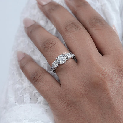 Five Stone Round And Tapered Baguette Diamond Ring