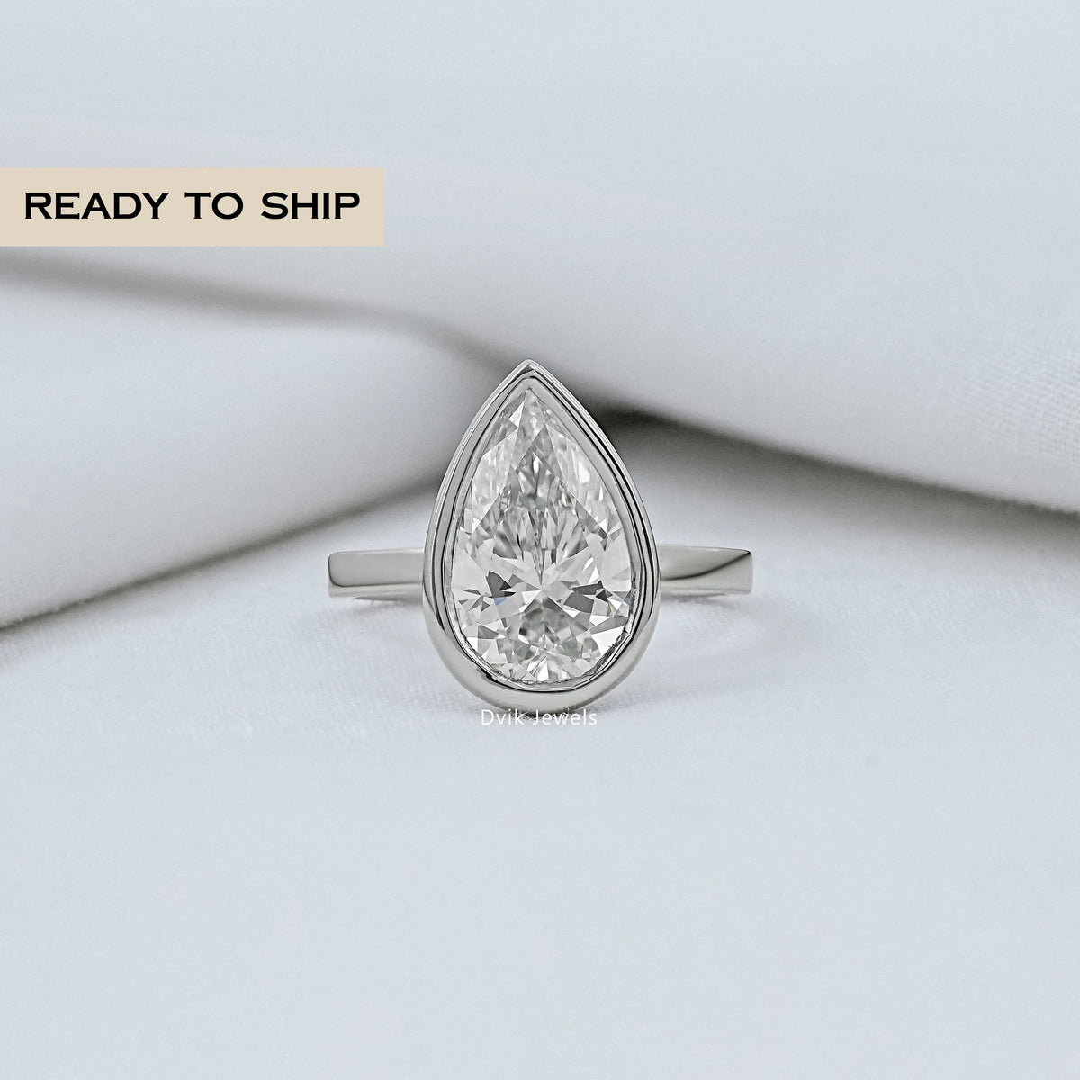 Bezel Pear Cut Solitaire Engagement Ring