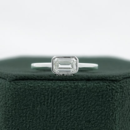 Bezel Set East-West Emerald Cut Engagement Ring