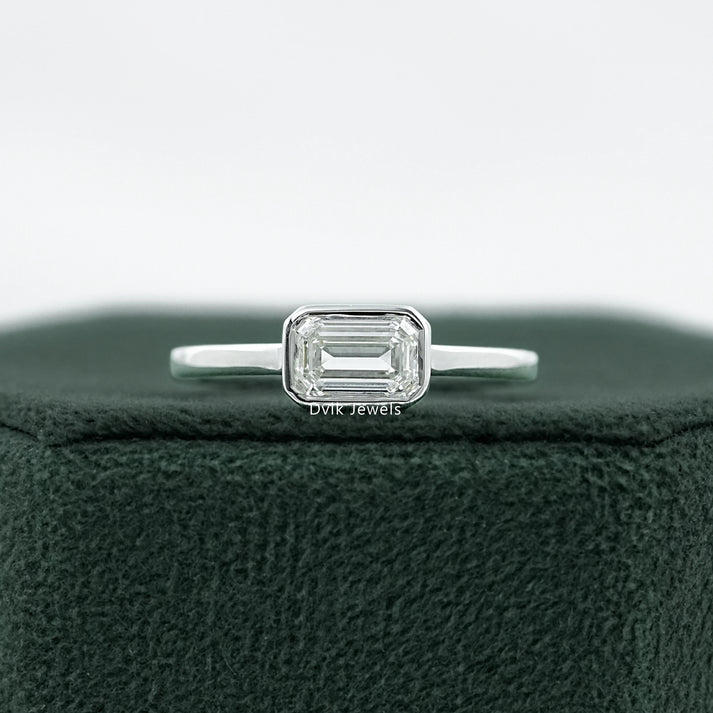 East West Emerald Cut Bezel Engagement Ring