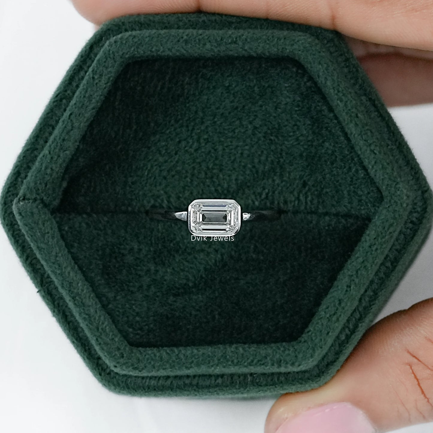 Bezel Set East-West Emerald Cut Engagement Ring