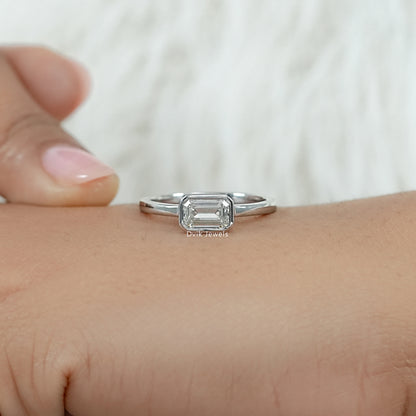 Bezel Set East-West Emerald Cut Engagement Ring