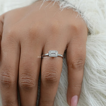 Bezel Set East-West Emerald Cut Engagement Ring