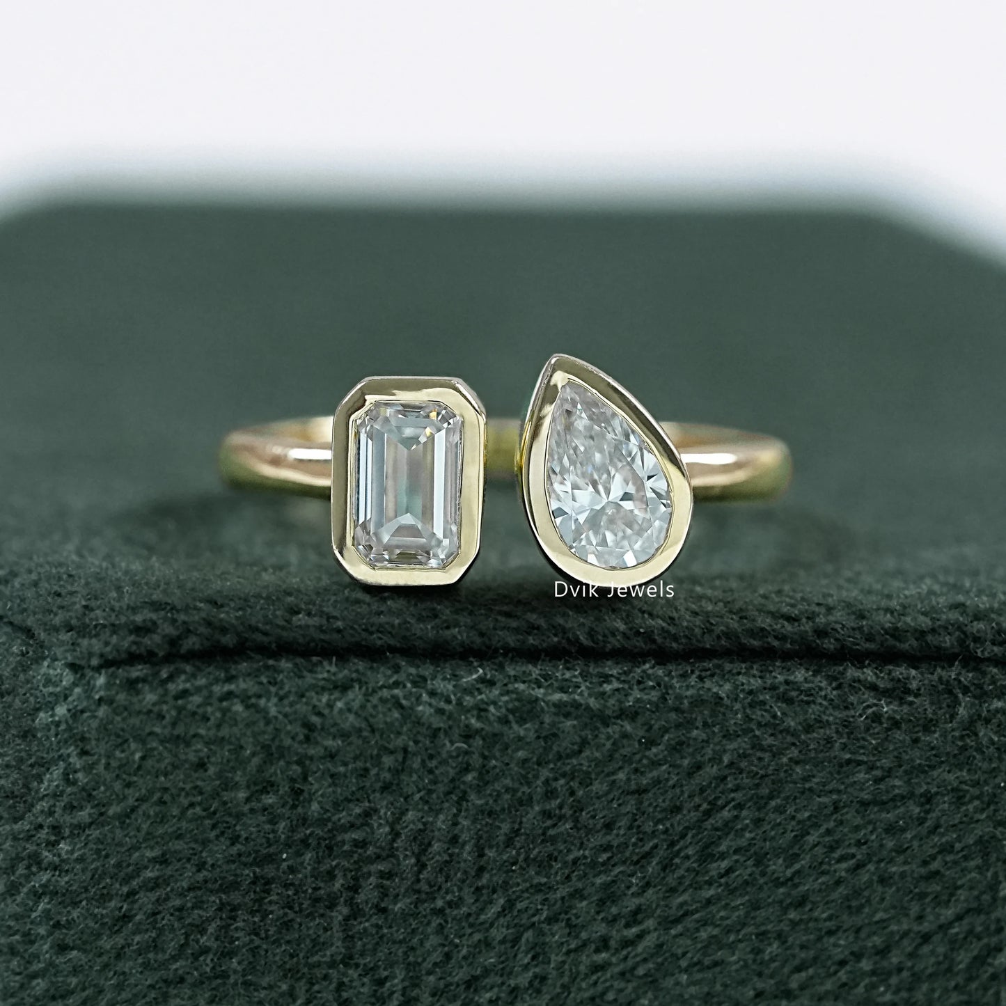 Bezel Set Emerald And Pear Cut Lab Diamond Toi Moi Ring