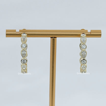 Bezel Set Pear And Round Diamond C Hoop Earrings