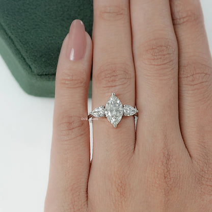 Lab Diamond Three Stone Marquise Cut Engagement Ring styled on hand showing classic beauty
