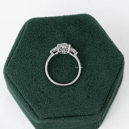 Three-Stone Oval And Round Cut Diamond Ring