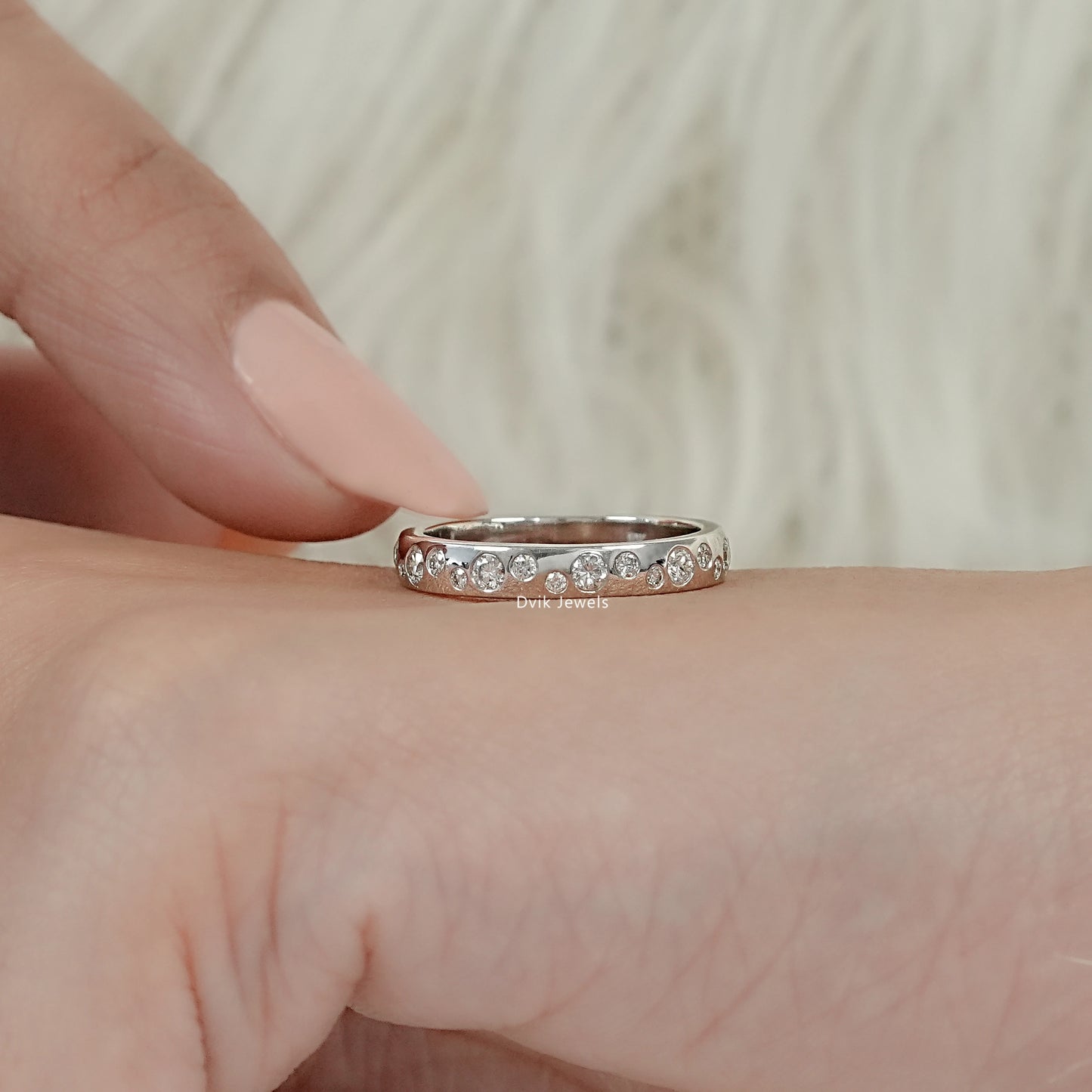 Round Cut Diamond Scattered Bezel Set Wedding Band