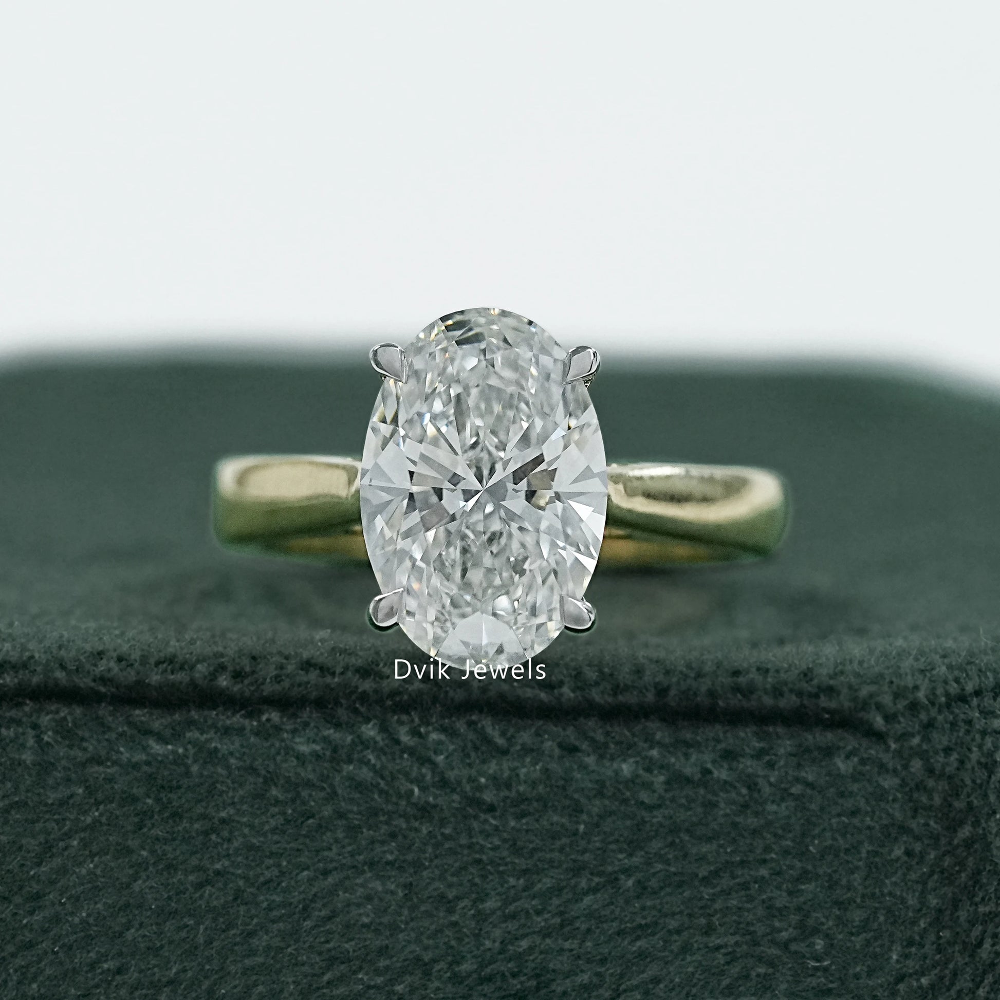 Front view of Dvik Jewels Oval diamond engagement rings solitaire featuring a high-clarity stone.