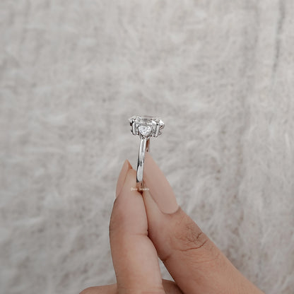 Three-Stone Oval And Round Cut Diamond Ring