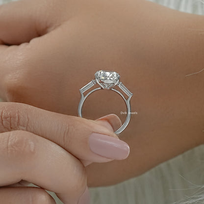 Oval lab diamond engagement ring with baguette accents close up view