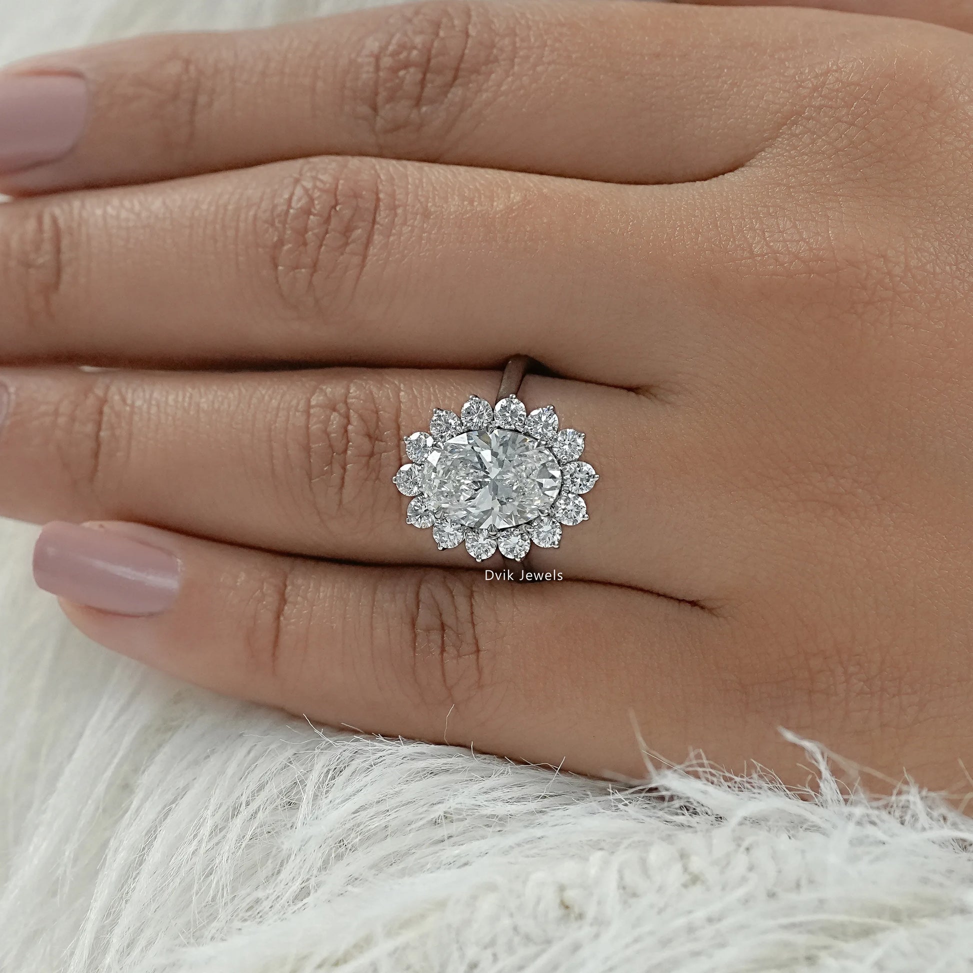 Floral engagement rings with lab created diamond halo top view