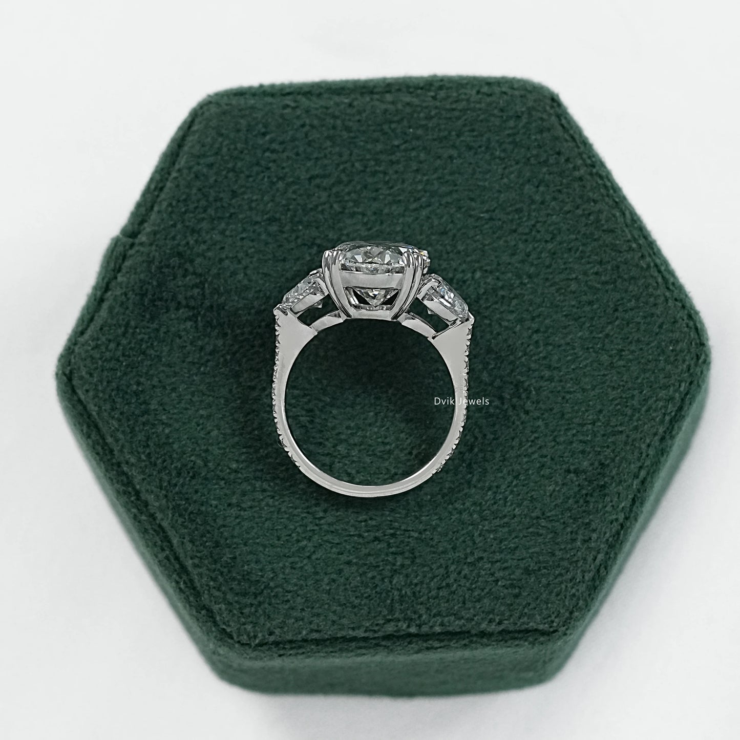 Double prong oval engagement ring oval diamond ring with side stones side view