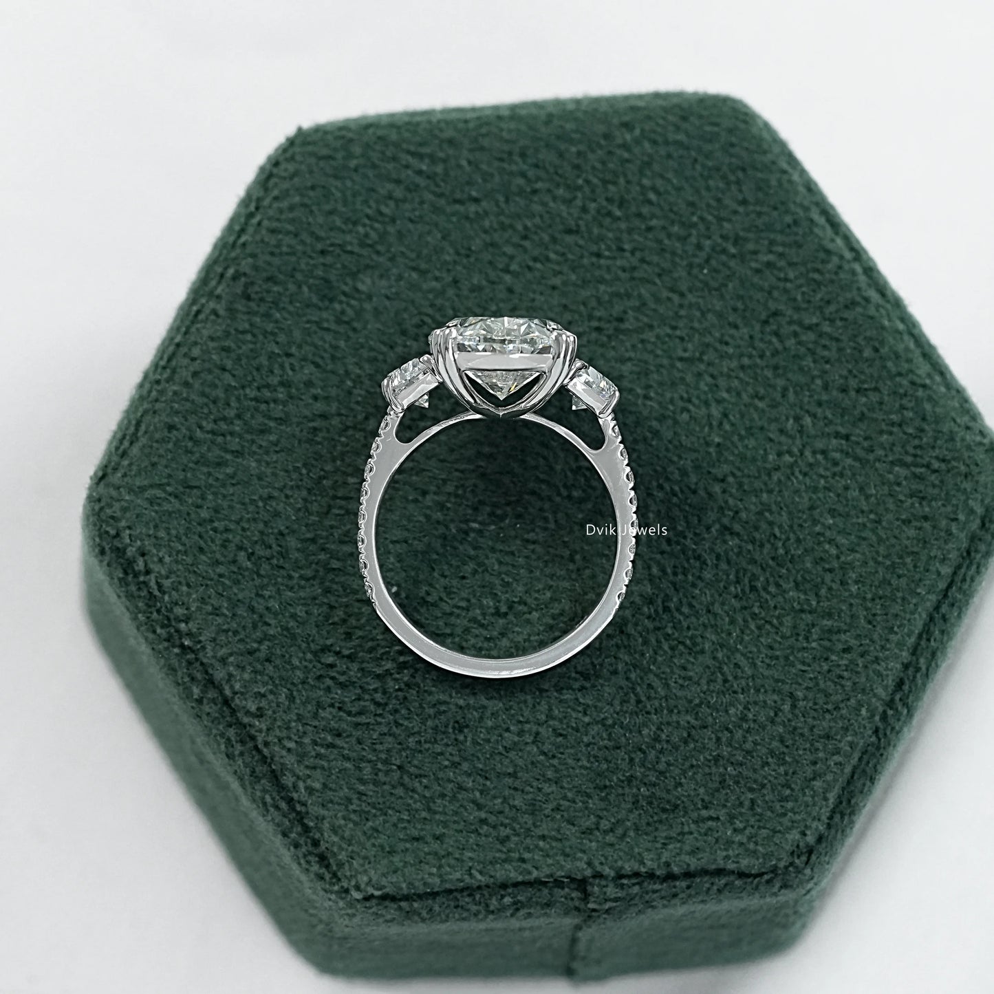 Oval half moon engagement ring white gold side view