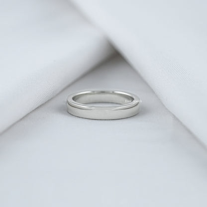 Pear cut diamond sleek band back view with smooth finish