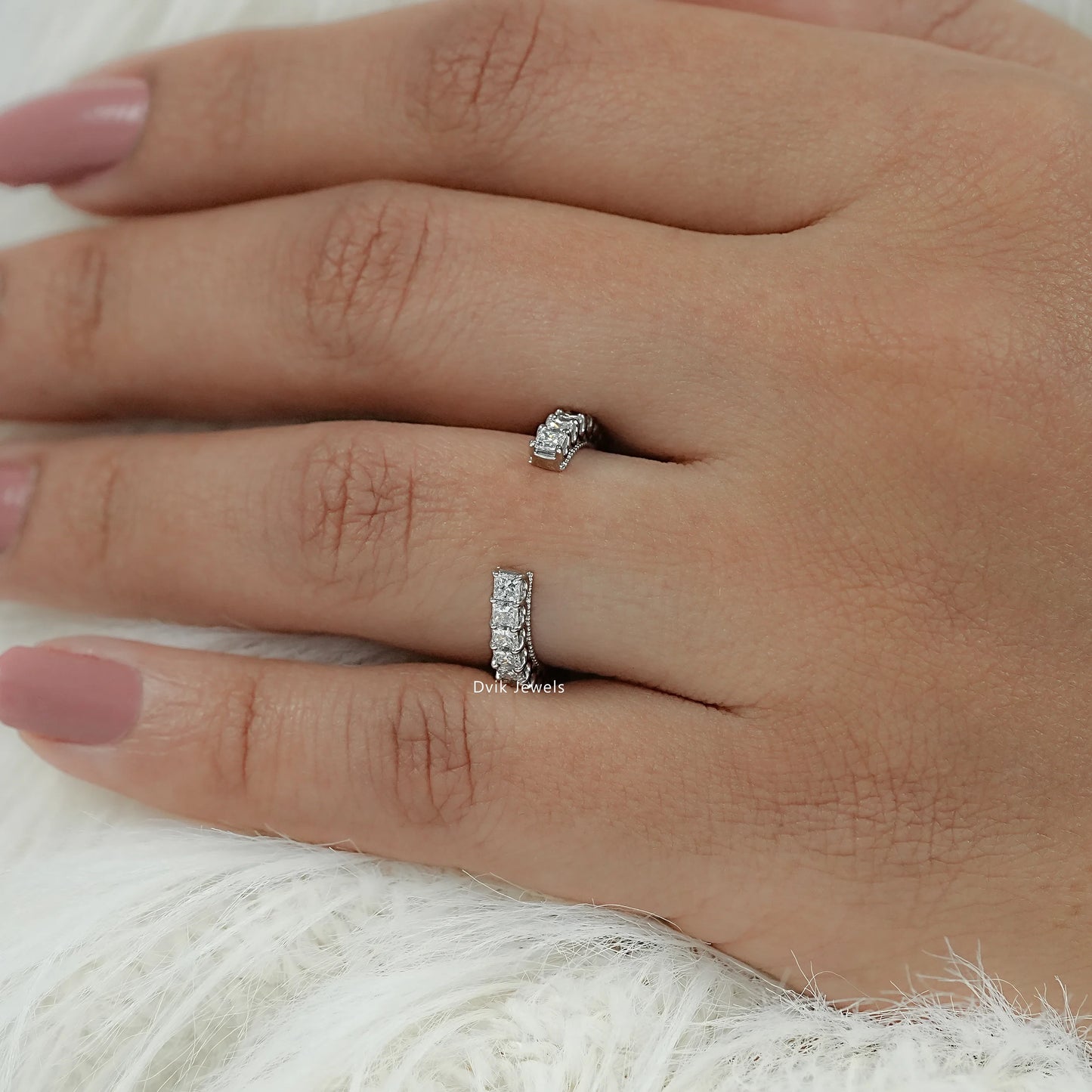 Model hand wear princess open cuff band featuring gia certified lab grown diamond