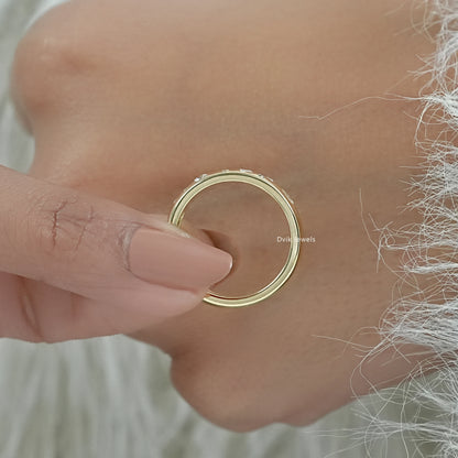 Flush set engagement ring close-up on a white surface for sharp detail