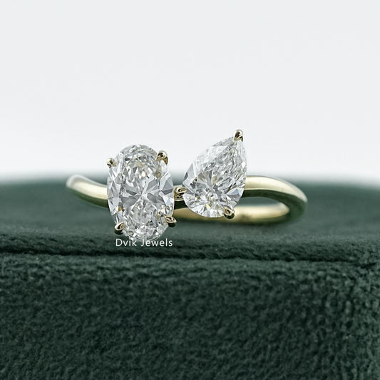 two diamond engagement ring by Dvik Jewels in a green velvet box angle view